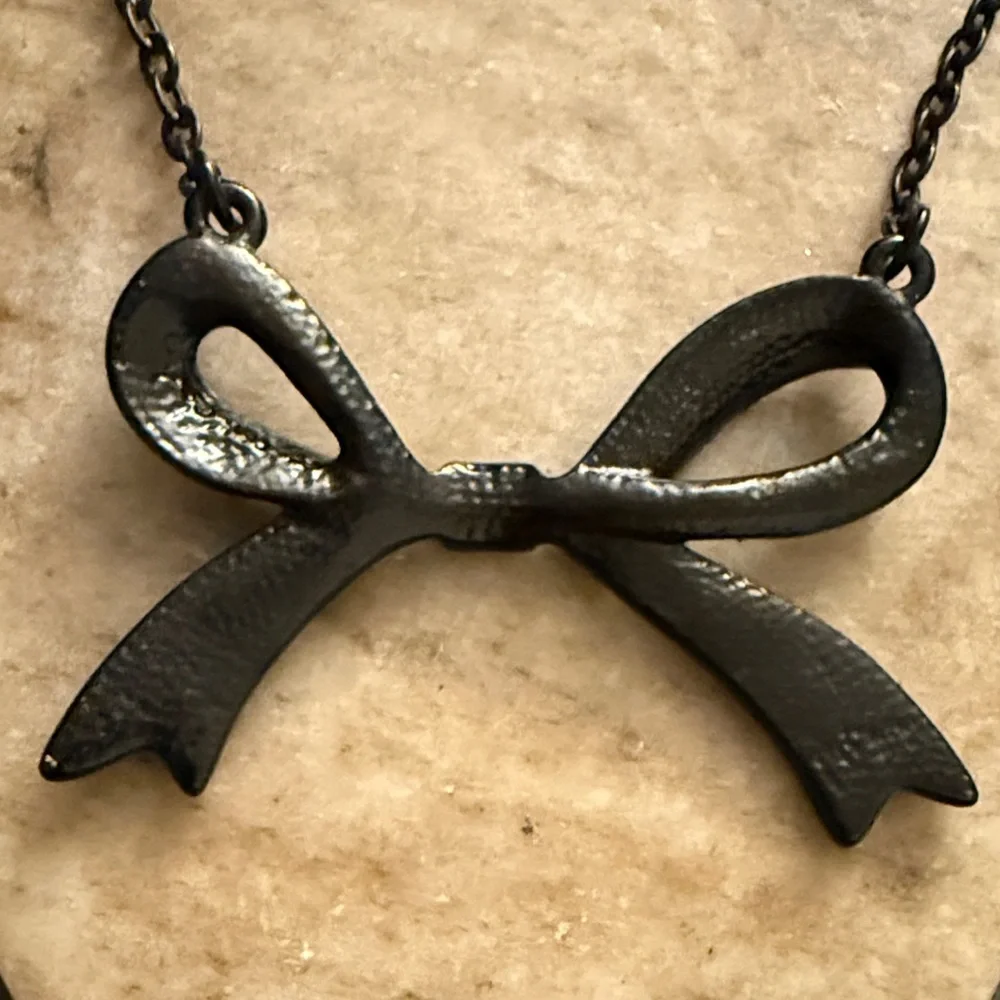 Gunmetal hematite-toned necklace a Bow Statement Vintage pendant &BLK Rhinestone